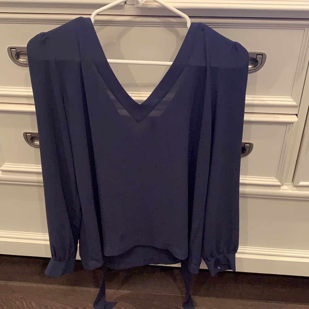 Double v neck, bow tie back blouse